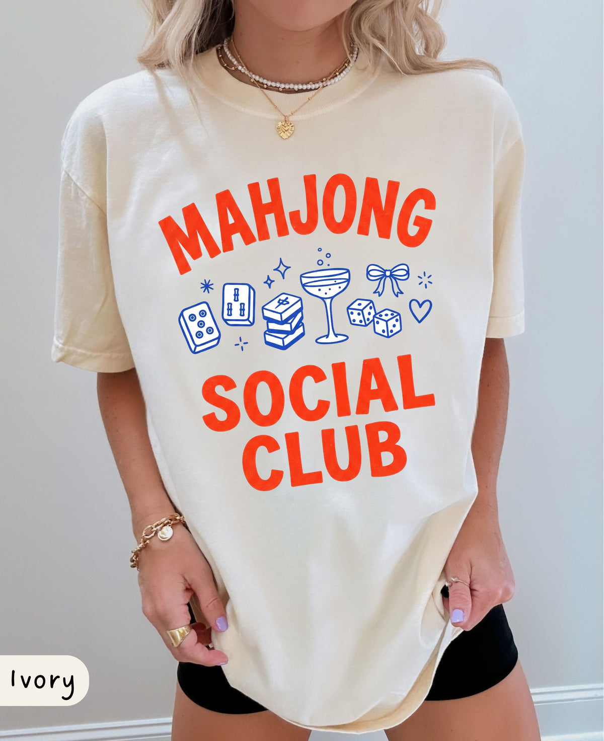 Mahjong Social Club shirt in ivory, Comfort Colors tee with red lettering and blue mahjong tile graphic
