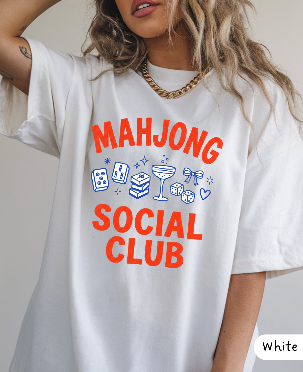 White Mahjong Social Club oversized tee with red lettering and blue mahjong tiles, cocktail and dice