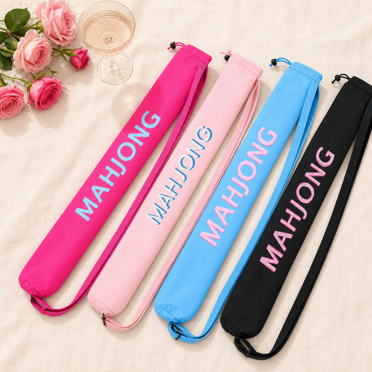 Mahjong mat carry bags in all four colors: pink, light pink, blue and black