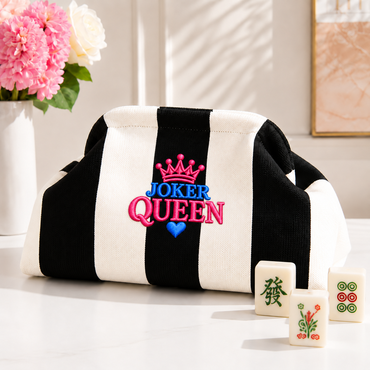 Classic Black and white striped knit mahjong tile clutch with pink and blue JOKER QUEEN crown embroidery