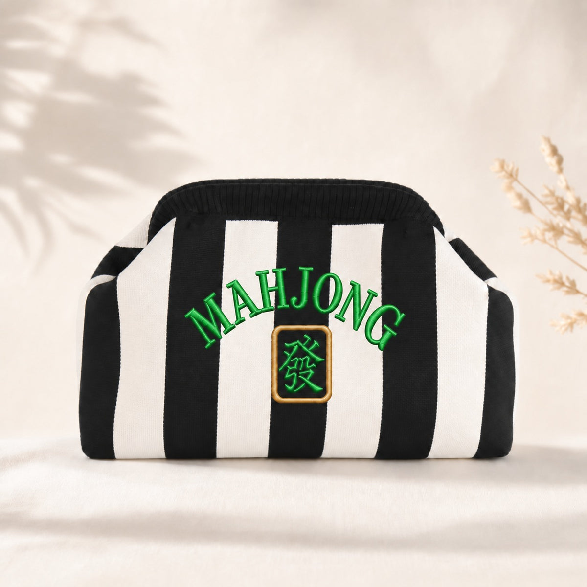 Classic Black and white striped knit mahjong tile clutch with green MAHJONG embroidery and Green Dragon tile