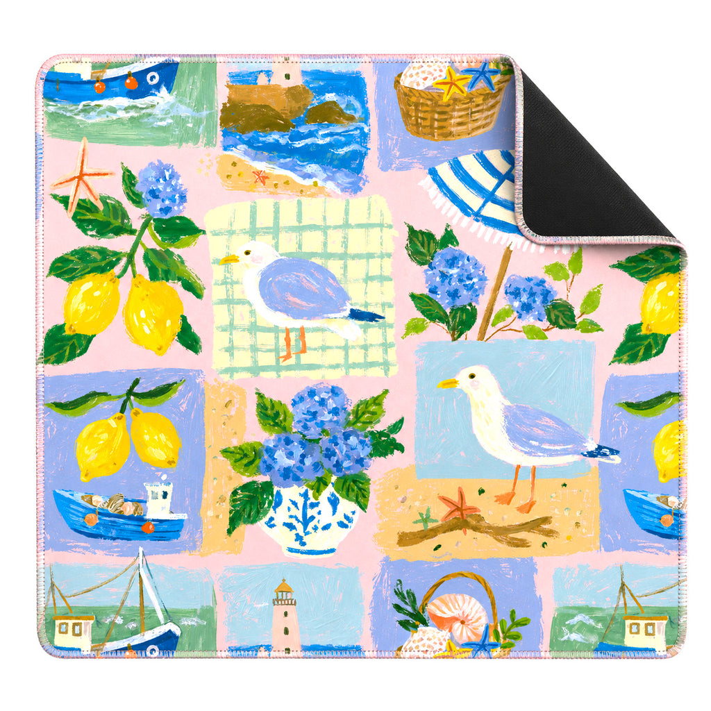 Coastal mahjong mat with a patchwork of seagulls, lemons, blue hydrangeas, boats and lighthouses